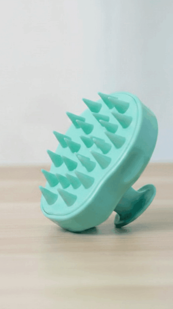 Image of a silicone scalp massager used to gently massage the scalp and stimulate circulation