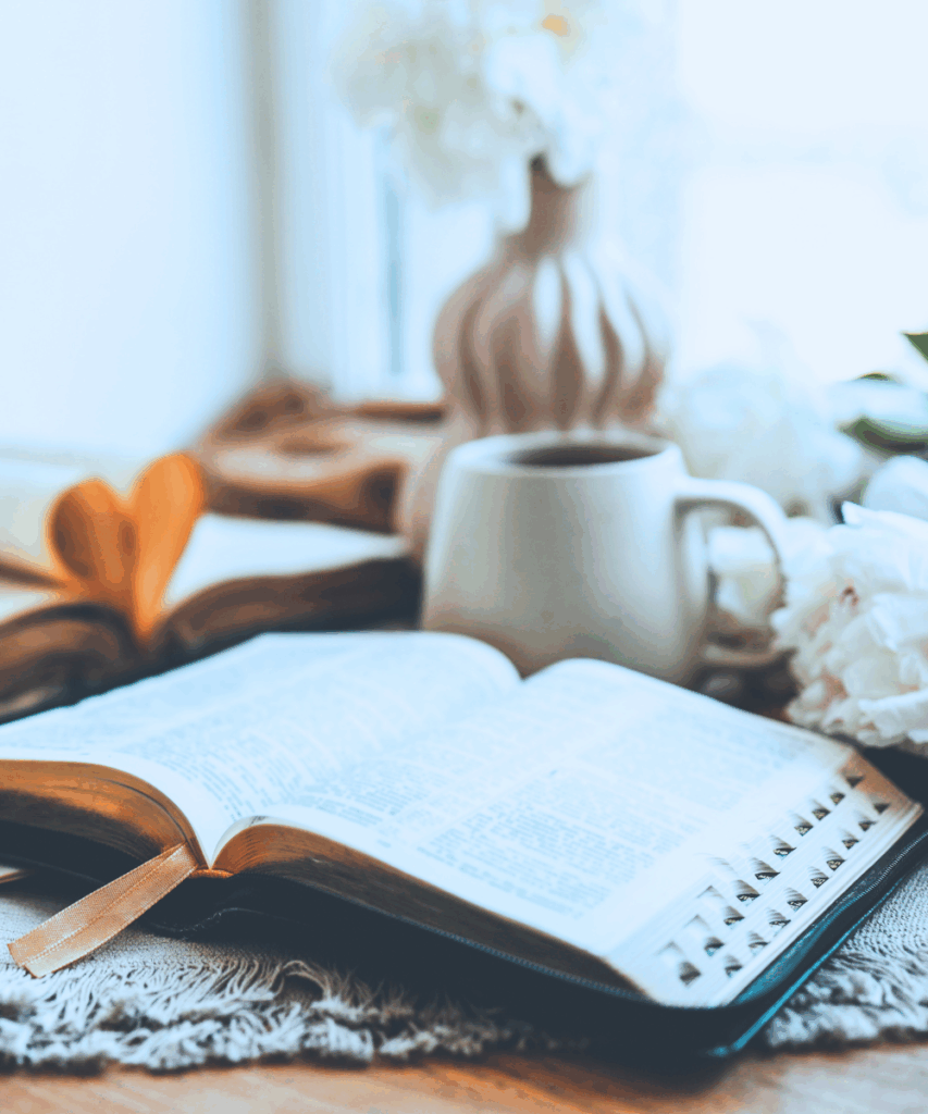quiet space with a cup of coffee a bible and some calm decor elements