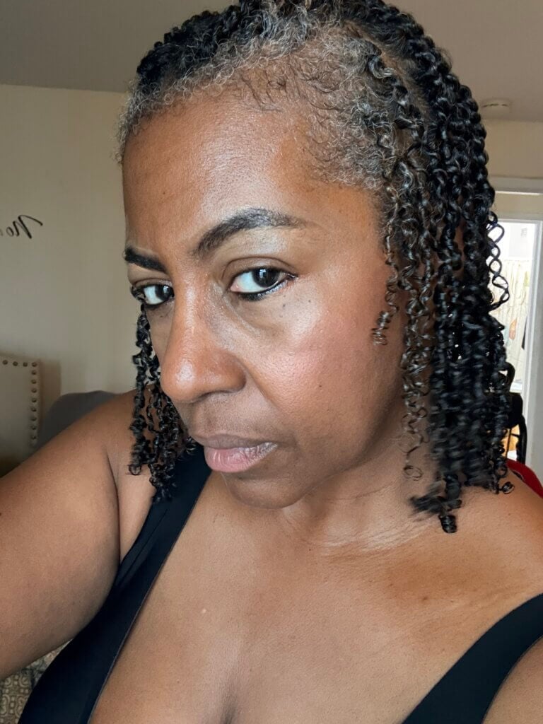 woman with graying hair in twists