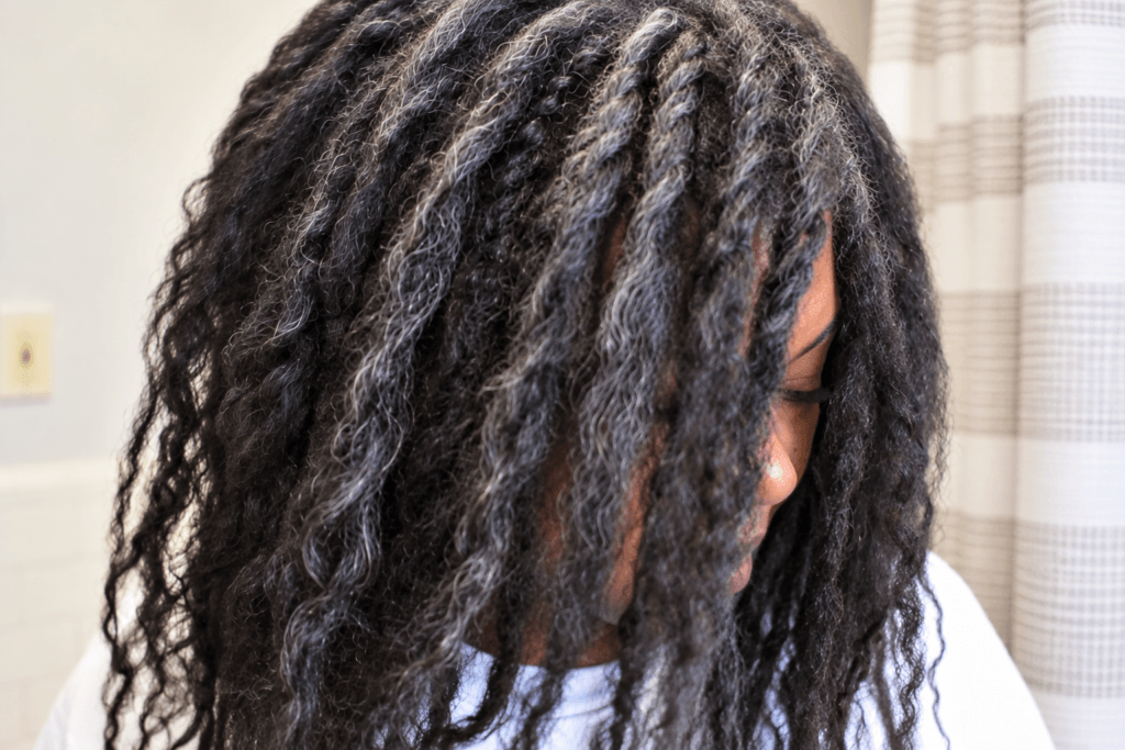 graying hair in loose twist